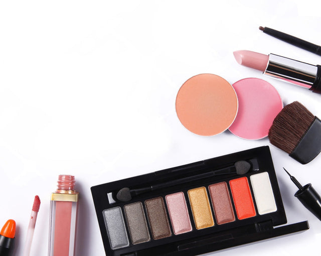 Makeup products including a palette, lipsticks, and a brush on a white background with 'Cosmetics' text.